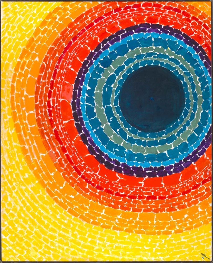 Image of Alma Thomas's work The Eclipse (1970). In this acrylic on canvas work, a dark blue circle at the center of the work is surrounded by increasing bright cricles, from blue and green, to red, orange and finally bright yellow. The paint is applied in broad strokes and some of the white canvas shines through. 