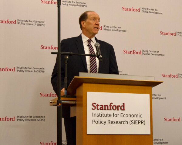 World Financial institution president clarifies stance on local weather change in Stanford discuss